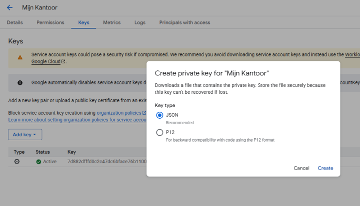 Tabblad Keys van het service account met het venster Create private key waarin het sleuteltype JSON is geselecteerd.